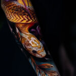 A yellow snake with spider