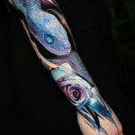 A blue snake sleeve with roses