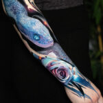 A blue snake sleeve with roses