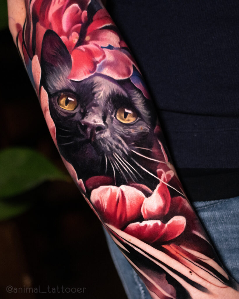 A black cat in flower