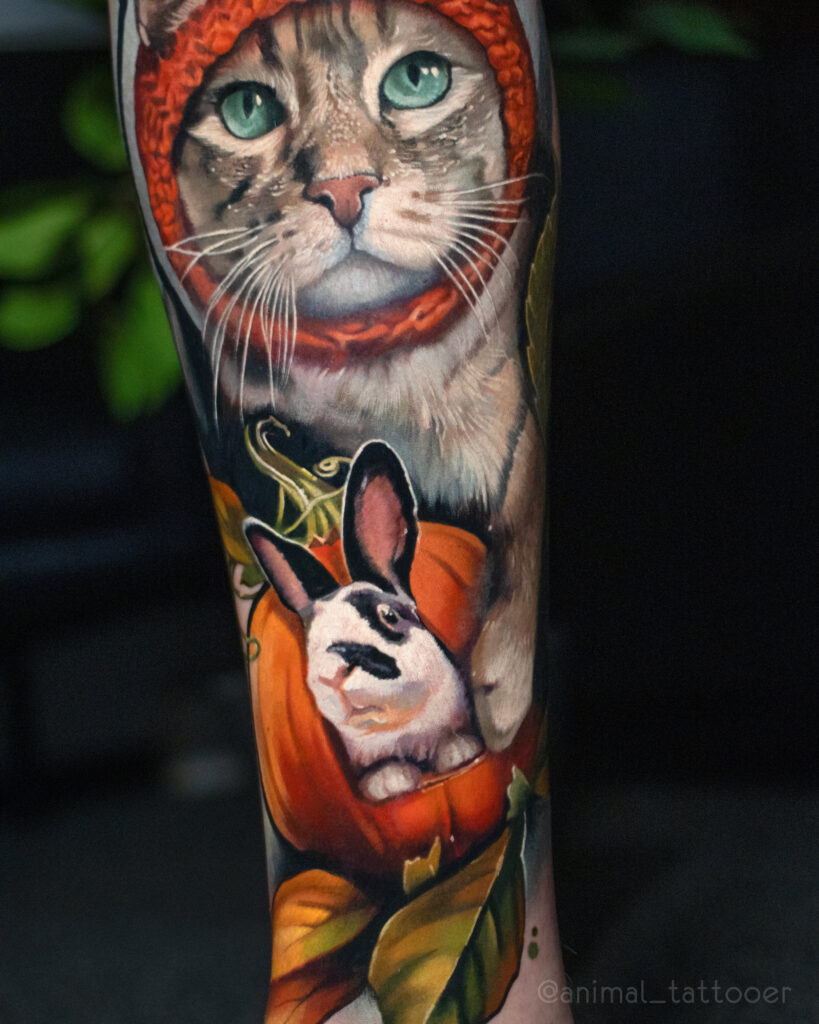 a cat with a pumpkin hat and bunny